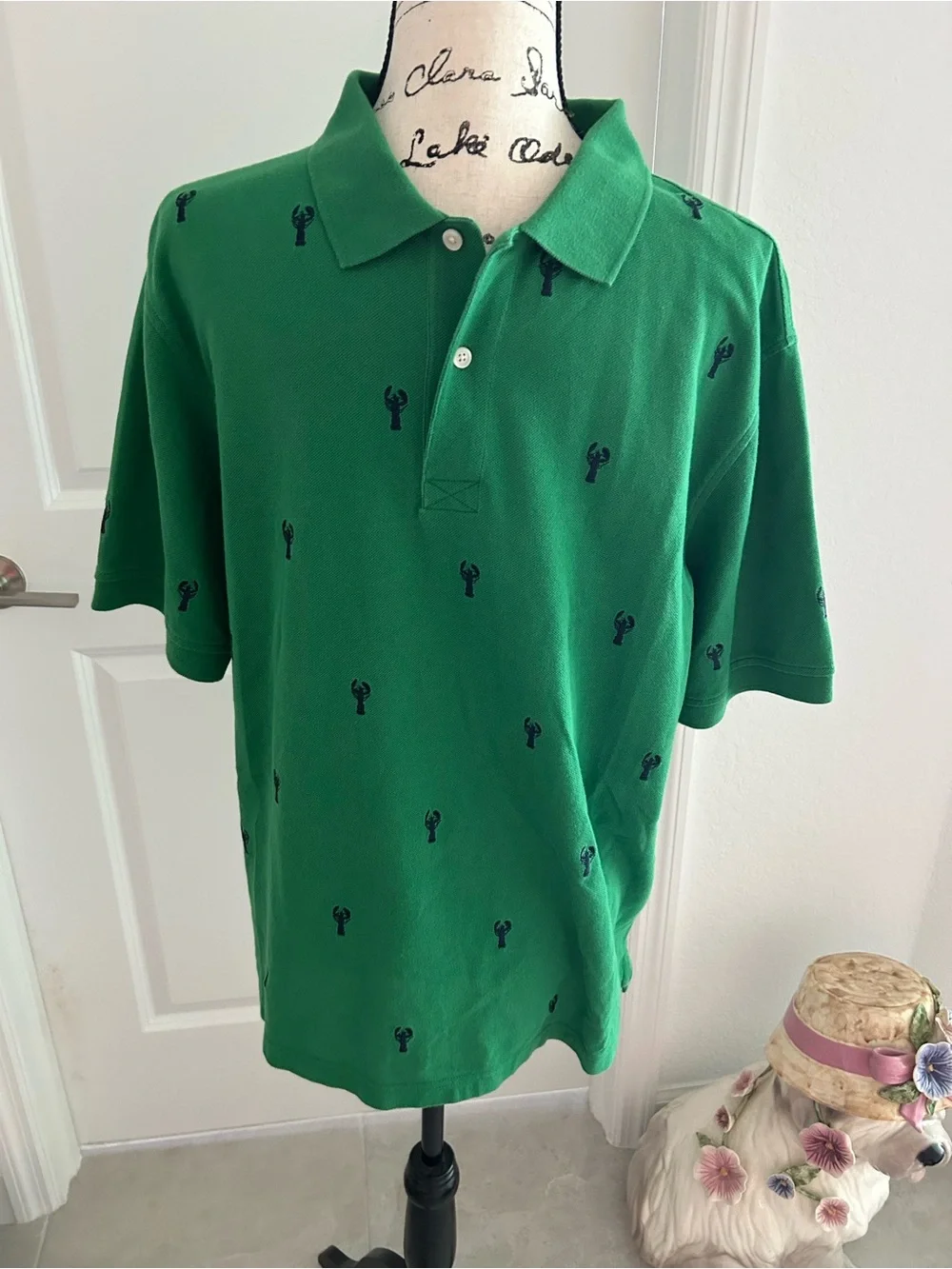 Green Polo Shirt with Navy Embroidered Lobsters. Size L